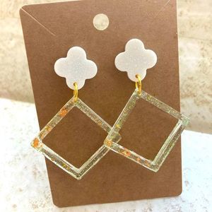 White & green glitter earrings